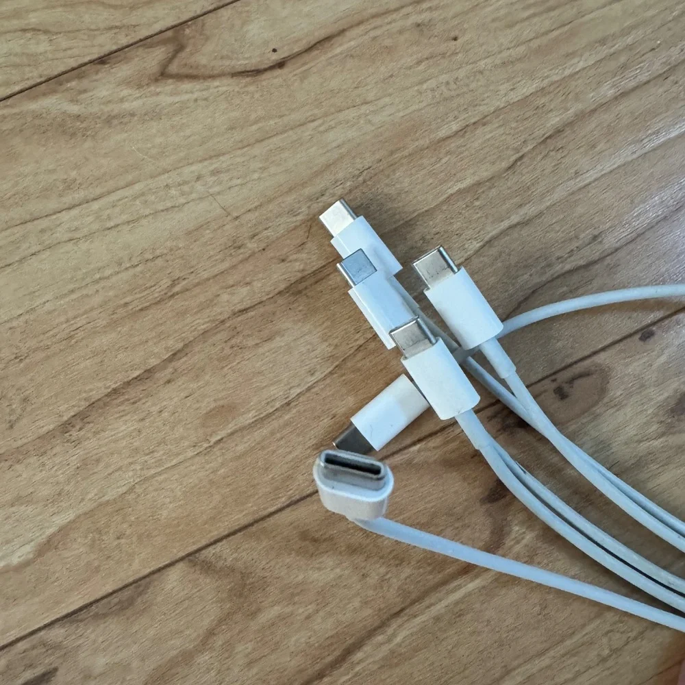 8 (eight) for all of them - Apple - 3.3' (1M) USB-C to Lightning Cable - White